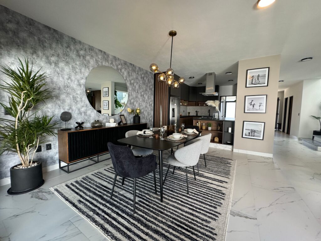 Stylish modern dining room featuring elegant decor and natural lighting for a luxurious ambiance.